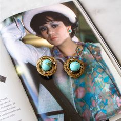 Presenting A Rare And Remarkable Find - Coco Chanel Lifetime Earrings By Robert Goossens. Creations From This Highly Recognizable Collection Produced From The Late 1950s Till The Early 1960s Have Graced The Metropolitan Museum Displays And Featured Prominently In Various Publications And Exhibitions. These Collectible Chanel Goossens Earrings Showcase Faux Turquoise Pate De Verre Rounded Cabochons, Meticulously Set In The Signature Handmade Bird's Nest Wire Setting Made Of Gilded Bronze. Like Many Of Chanel's Early Costume Jewelry Creations, They Are Unsigned. Remarkably, These Earrings Were Acquired From A Model Who Worked Closely With Mademoiselle Chanel Herself During The 1960s. Despi Mademoiselle Chanel, Museum Displays, Birds Nest, Chanel Jewelry, Bird Nest, Jewelry Creation, Coco Chanel, Metropolitan Museum, Blue Gold