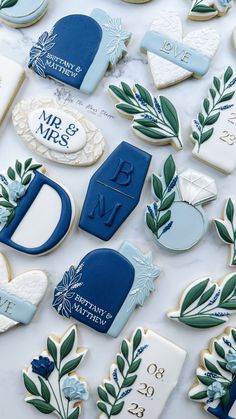 cookies decorated with royal blue and white frosting are on display at the national museum