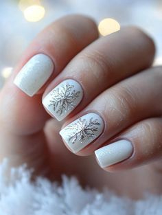 White Christmas Nails: Festive and Elegant Holiday Nail Designs New Years Eve Nail Art Designs, White Tip Snowflake Nails, Silver Christmas Nail Ideas, Winter Nails White And Gold, Not So Christmas Nails, White Snowflake Nail Design, Christmas Bride Nails, White Nails With Silver Snowflakes, Nails With Snowflakes Winter