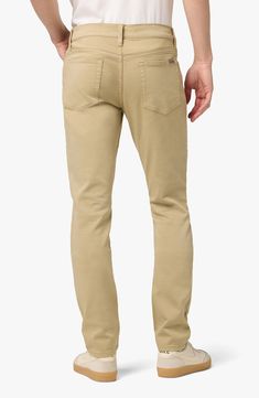 Always trendy, these slim-cut pants are made from a softened cotton blend and garment-dyed in a solid hue for versatility. 29" inseam; 11" rise (size 32) Zip fly with button closure Five-pocket style 99% cotton, 1% elastane Machine wash, tumble dry Imported Model stats: 6'1" height, 32" waist. Model is wearing size 32. British Khaki, Slim Leg Pants, Slim Leg, Slim Legs, Leg Pants, Nordstrom Rack, Cotton Blend, Nordstrom, Slim Fit