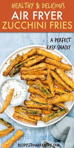 air fryer zucchini fries on a plate with dipping sauce