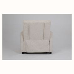 a white chair sitting on top of a gray floor