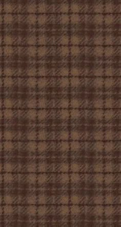 a brown and black plaid pattern on fabric