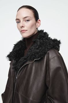 SHEARLING-LINED NAPPA HOODED JACKET Luxury Hooded Outerwear With Faux Fur Lining, Luxury Fall Parka, Sheepskin Hooded Outerwear With Faux Fur Trim, Hooded Sheepskin Outerwear With Faux Fur Trim, Hooded Outerwear With Faux Fur Trim In Sheepskin, Hooded Outerwear With Faux Fur Trim And Sheepskin, Hooded Shearling Outerwear With Faux Fur Lining, Luxury Brown Outerwear With Faux Fur Lining, Fall Sheepskin Outerwear With Detachable Hood