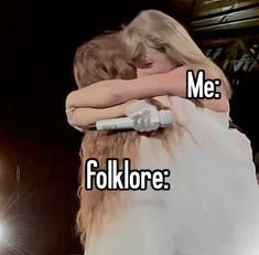 two people hugging each other with the caption me folklore