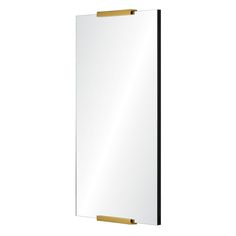 a white and black mirror with gold trim