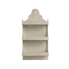 a white wooden shelf with three shelves on each side and two hanging hooks at the top