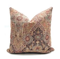 a decorative pillow made from an old rug