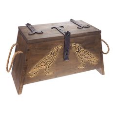 a wooden box with two birds painted on it