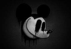 a mickey mouse head with dripping paint on it's face and tongue sticking out