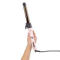 Designed to make curling hair fast and easy, the Le Pirouette 26mm curling iron features push button automatic curling action for full-body curls. Rotate the titanium barrel either right or left, and then recenter the iron with a single push of a button. The clip allows you to secure your hair, while the cool plastic end tip helps reduce the likelihood of burns common with traditional curling wands. With adjustable temperature settings, Le Pirouette is right for most hair types and lengths, exce Curling Wands, Dry Shampoo Powder, Rotating Curling Iron, L'ange Hair, Curling Hair, Lasting Curls, Hair Quiz, Long Lasting Curls, Finishing Spray