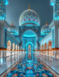 the inside of an ornate building with blue and gold decorations