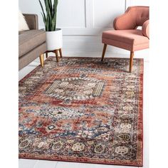 an area rug with various colors and designs