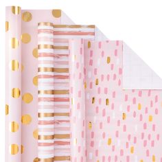 pink, gold and white wrapping paper with polka dots on the top in different sizes