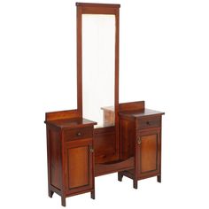 a wooden vanity with mirror and two drawers on top of each drawer, against a white background