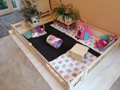 an overhead view of a baby's play room with toys and decorations on the floor