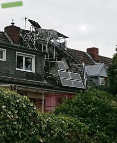 a house that has some kind of solar panel on the roof