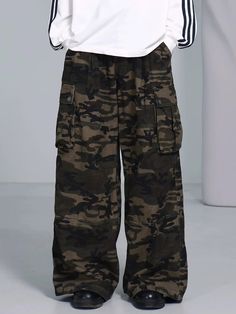 Camouflage Print Wide Leg Cargo Pants Discover the perfect blend of style and functionality with our Camouflage Print Wide Leg Cargo Pants. Designed for comfort and versatility, these cargo pants are perfect for any adventure. Size Chart (in cm): Size S M L XL Length 104 106 108 110 Waist 70 74 78 82 Hip 120 124 128 132 Thigh 70 72 74 76 Camouflage Cotton Cargo Parachute Pants, Combat Pants With Multiple Pockets, Camouflage Wide Leg Cargo Bottoms, Casual Camouflage Cotton Cargo Pants, Combat Cargo Pants With Side Pockets, Combat Style Cargo Pants With Hip Pockets, Camouflage Wide Leg Military Pants, Baggy Hiking Pants With Pockets, Baggy Hiking Pants With Side Pockets