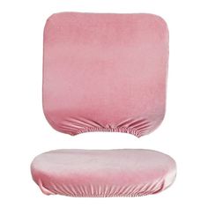 a pink chair with a pillow on it's back and the seat cushion folded down