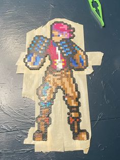 a piece of paper that is made to look like an old video game character