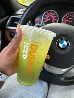 Hand holding a Dunkin’ iced Kiwi Watermelon Refresher in front of a car dashboard Dunkin Refreshers, Watermelon Refresher, Dunkin Donuts Iced Coffee, Summer Drinks, Stay Cool, Iced Coffee, Kiwi