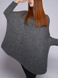 This beautiful over-sized sweater features simple style with fitted sleeves that makes you stylish and on trend. It is made of 100% eco cotton yarn in a beautiful charcoal/ dark grey color. No itch at all! It is a perfect item for Fall/winter that you can layering with tunic or shirt. Size: one size fit most. Hand wash only and lay flat to dry. I have other colors for this poncho. Pls. Check my shop for details: http://www.etsy.com/shop/MaxMelody?section_id=7175104 Thanks for stop by my shop! Oversized Knitted Gray Cardigan, Oversized Gray Knitted Cardigan, Oversized Gray Textured Knit Sweater, Gray Knitted Sweater For Fall, Gray Knit Sweater For Fall, Oversized Gray Knitted Sweater, Gray Long Sleeve Knitted Sweater, Gray Knitted One-size Sweater, One-size Knitted Gray Sweater