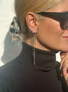 Introducing our exquisite Long Silver Earrings - a fine masterpiece exclusively crafted for you. Expertly handcrafted from high-quality stainless steel, this unique pair features three delicate minimal chains of varying lengths gracefully embraced by a seamless push back closure. The pièce de résistance lies in the stunning silver bar adorning the front, lending an extraordinary charm to the final creation. Lightweight and remarkably comfortable, these earrings epitomize elegance and are availab Formal Metal Drop Wrap Earrings, Trendy Sterling Silver Earrings For Evening, Elegant Single Dangle Threader Earring, Elegant Silver Teardrop Wrap Earrings, Sterling Silver Linear Earrings For Evening, Elegant Pierced Wrap Earrings Gift, Elegant Single Metal Wrap Earring, Silver Minimalist Earrings For Evening, Evening Sterling Silver Linear Earrings