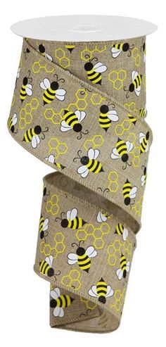 a roll of ribbon with bees on it