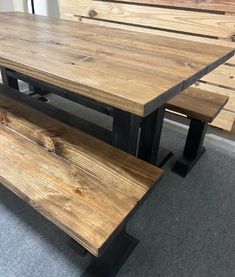 Introduce this modern-style trestle farmhouse table into your dining room or kitchen today. This wooden table set includes two long benches that extend the same length as the table for optimal seating. The base has been stained a true black, while the top has been stained a provincial brown. The combination of these colors brings the wood grain to life and gives it a modern look with a farmhouse feel. Measurements:Crafted from solid wood, the table boasts a satin poly finish that provides both elegance and protection. The tabletop measures 37 inches in width, while the base is slightly broader at 39 inches. The overhang at each end averages around 12 inches. The bench spans the entire length of the table and can be conveniently slid under the trestle for optimal seating arrangements. The f Dining Table With Benches, Table With Benches, Modern Provincial, Turned Table Legs, Long Bench, Classic Table, Wooden Dining Table, Dining Table With Bench, Pedestal Table