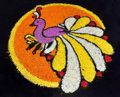 an image of a bird made out of flowers on the ground in front of a black background