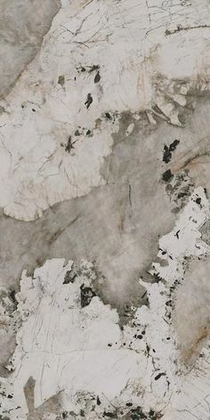 an image of a marble surface that looks like it has been painted white and grey