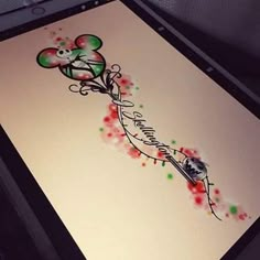 an image of a drawing on the back of a computer screen with flowers and hearts