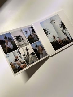 an open photo book with photos of people and palm trees on the cover, in front of a white wall