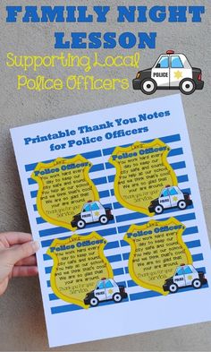 a hand holding up a poster with the words family night lesson and police officer appreciation notes