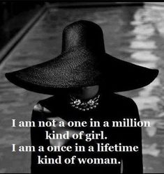 a woman wearing a black hat with the words i am not a one in a million kind of girl