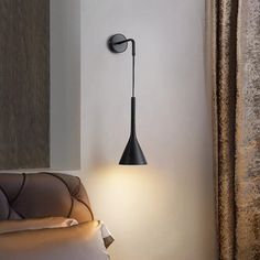 a lamp that is on the side of a wall