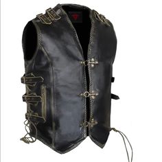 High Grade Cowhide Leather Side Laces And Buckles For Adjustment Two Inside Concealed Carry Pockets One Inside Microphone Pocket One Inside Phone Pocket Two Waist Zippered Pockets Single Back Panel For Patches Us Standard Sizing. Available In All Sizes From 3x-6x Leather Outerwear With Rivets For Biker Events, Gothic Black Leather Biker Jacket, Black Leather Biker Jacket With Rivets, Gothic Leather Outerwear For Biker Events, Black Gothic Leather Jacket For Biker Events, Black Leather Jacket With Rivets For Biker Events, Black Biker Jacket With Rivets, Steampunk Black Vest For Fall, Distressed Black Leather Biker Jacket