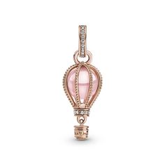 Reach new heights with the Sparkling Pink Hot Air Balloon Dangle Charm. This warm-toned charm is hand-finished in 14K rose gold-plating. Beaded ropes encase a fairy tale pink crystal accented by shimmering clear cubic zirconia. The bail and base of the balloon are embellished with glittering pavé. Below, a small gondola awaits to transport you to your destination. Wear it for daily inspiration or gift it to someone who is ready for their next adventure. Pink Hot Air Balloon, Pandora Rose, Charms Pandora, Travel Charms, Bracelet Pandora, Beaded Rope, Pandora Bracelet Charms, Dangle Charms, Christmas Gifts For Women