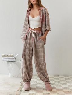 Description Unwind and relax in style with our Pink Loose Pajama Set. This luxurious loungewear is designed to provide you with the utmost comfort while making you feel effortlessly chic.Crafted from soft and breathable fabric, this pajama set feels gentle against your skin, ensuring a comfortable night's sleep. The loose, relaxed fit allows for freedom of movement, making it perfect for lounging around the house or getting a good night's rest.The pink color exudes a sense of femininity and char Top In Pizzo, Plaid Shirt Outfits, Stylish Pajamas, Patchwork Shirt, Mode Design, Contemporary Chic, Turndown Collar, Pyjama Set, Womens Casual Outfits