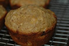 several muffins cooling on a wire rack