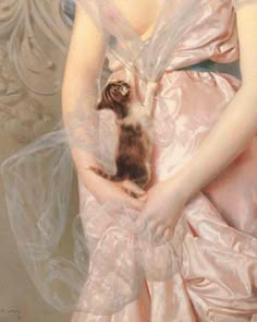 a painting of a woman holding a cat in her arms and wearing a pink dress