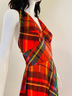 "Vintage 70s Coco of California halter maxi dress with an amazing print and even better silhouette! Perfect for the holidays. Red oversized plaid in green, yellow, burgundy. Fitted bodice with halter neck and exposed back. Nylon zipper closure in the back where the column meets. The skirt lines up at the seams and it's just so much fun. Excellent vintage condition. A few areas where it looks like there's print issues on the fabric. See photo collage. Not noticeable when worn.  Laundered. No fabr Plaid Romper, Maxi Halter Dress, Rare Dress, Dress History, Halter Maxi Dress, Fabric Labels, Halter Maxi, Vintage Glam, 70s Dress