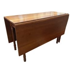 a wooden desk with two drawers on one end