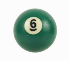 a green and white pool ball with the number six in it's center, on a white background