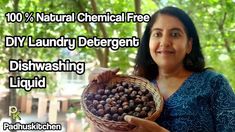 a woman holding a basket full of nuts in her hands with the words diy laundry deterant disinwashing liquid