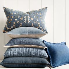 several pillows stacked on top of each other