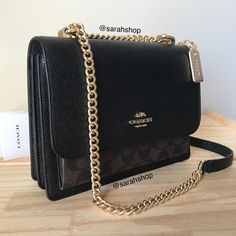 100% Authentic Coach 91019 Signature Klare Xbody Brown Black And Gold Hardware **Brand New With Tags** Approximate Measurements: 8.5" (L) X 6" (H) X 3" (W) Chain Strap Can Be Wear As A Crossbody Or Shoulder Style Coach Small Purse, Cute Purses Black, Coach Bag Black, Small Black Coach Bag, Coach Brown Shoulder Bag With Chain Strap, Coach Black Crossbody Bag, Brown Coach Shoulder Bag With Chain Strap, Small Black Coach Purse, Ladies Purses Handbags