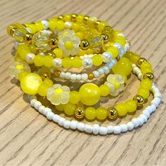 Handmade Bright Yellow White And Gold Bracelet. Women Teens Girls 7 Inches. 6 Beaded Stretchy Stackable Friendship Bracelets Mix And Match. Flower Beads Glass Resin Plastic Metal. Yellow Round Bead Jewelry For Summer, Yellow Bracelet Beads, White And Gold Bracelet, Gold Bracelet Women, Mickey And Minnie Love, White Beads Bracelet, Rare Beads, Friendship Bracelets With Beads, Yellow Bracelet