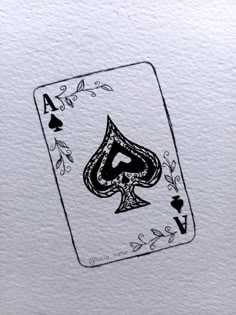 a playing card with the ace symbol drawn on it