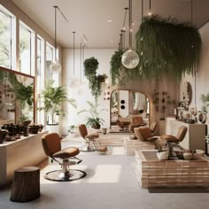 the interior of a hair salon with lots of plants